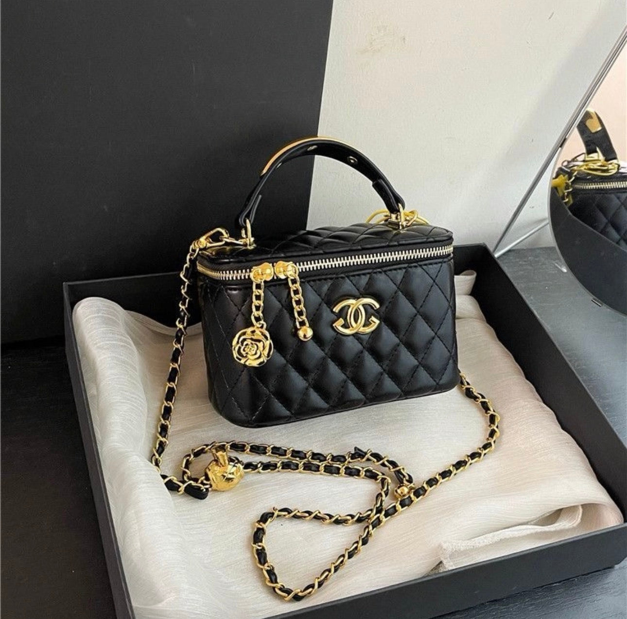 Sac Vanity Chanel – Cuir Matelassé Noir & Métal Doré
